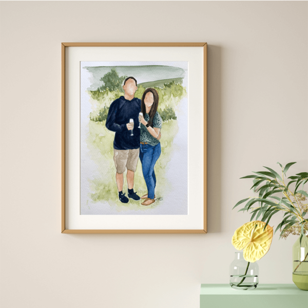 Watercolour engagement portrait of a couple in a frame
